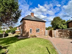 Side- click for photo gallery